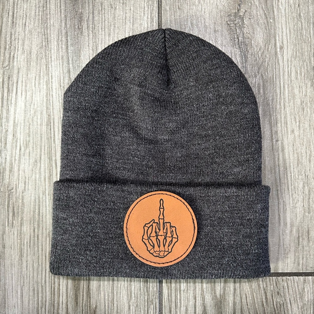 Laser engraved patch beanie. Skeleton hand